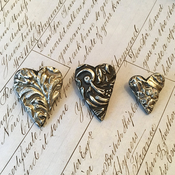 Silver heart top brooch