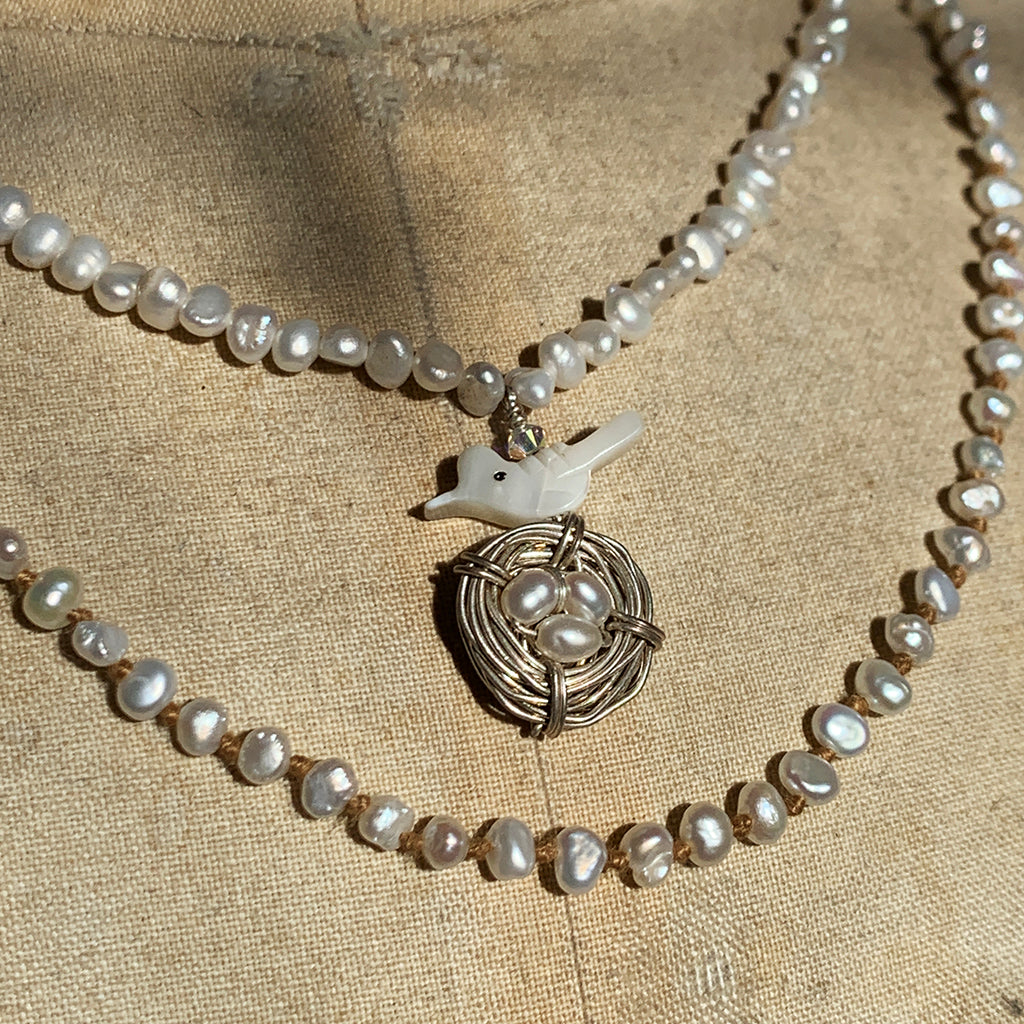 Tiny Baroque Pearl with Mother of Pearl Bird and Nest Pendant Necklace