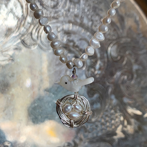 Tiny Baroque Pearl with Mother of Pearl Bird and Nest Pendant Necklace
