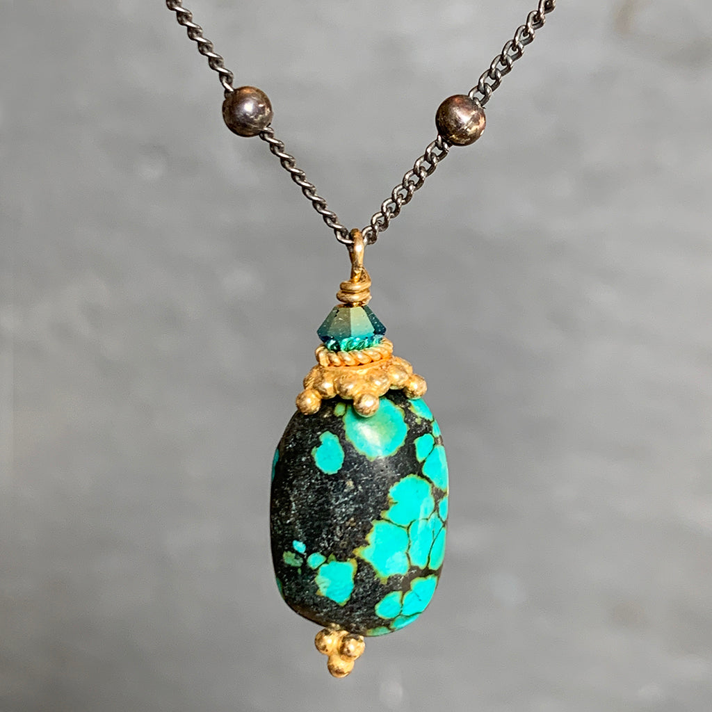 Genuine Turquoise Pebble with Gold Detail on an Oxidised Dotted Silver Chain Necklace
