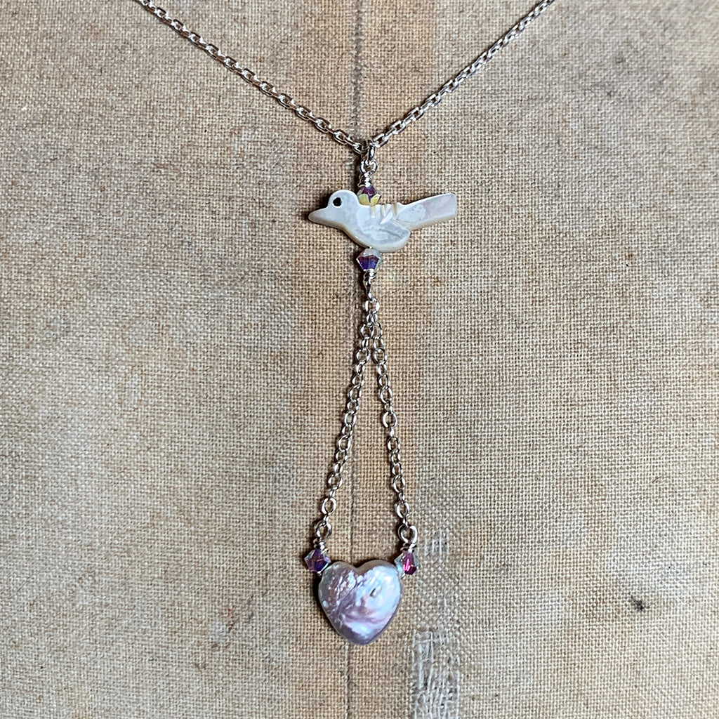 Mother of Pearl Bird with Freshwater Pearl Heart suspended on Silver Chain Necklace