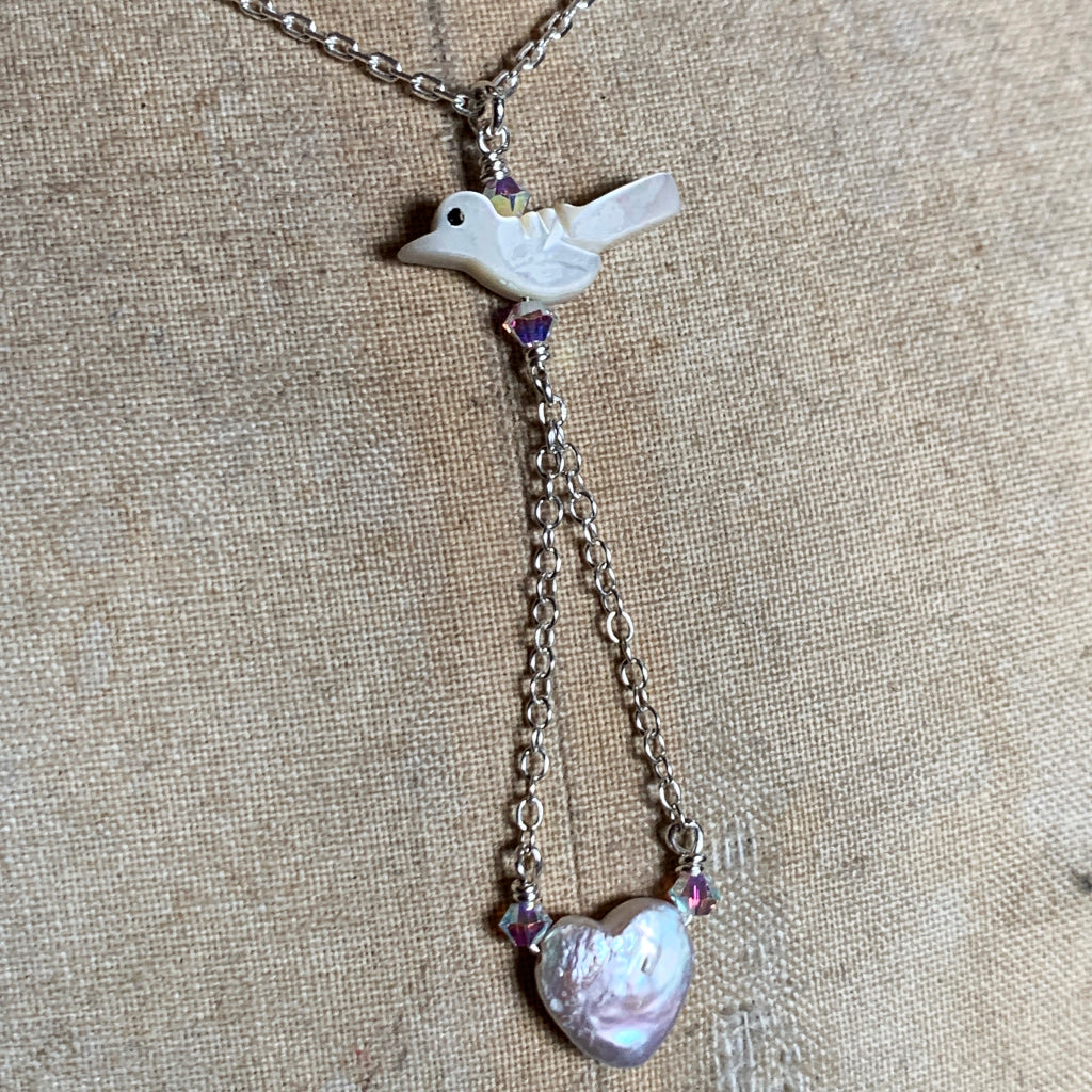 Mother of Pearl Bird with Freshwater Pearl Heart suspended on Silver Chain Necklace