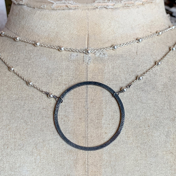 Large Oxidised Silver Halo on Bright Silver Dotted Chain Necklace