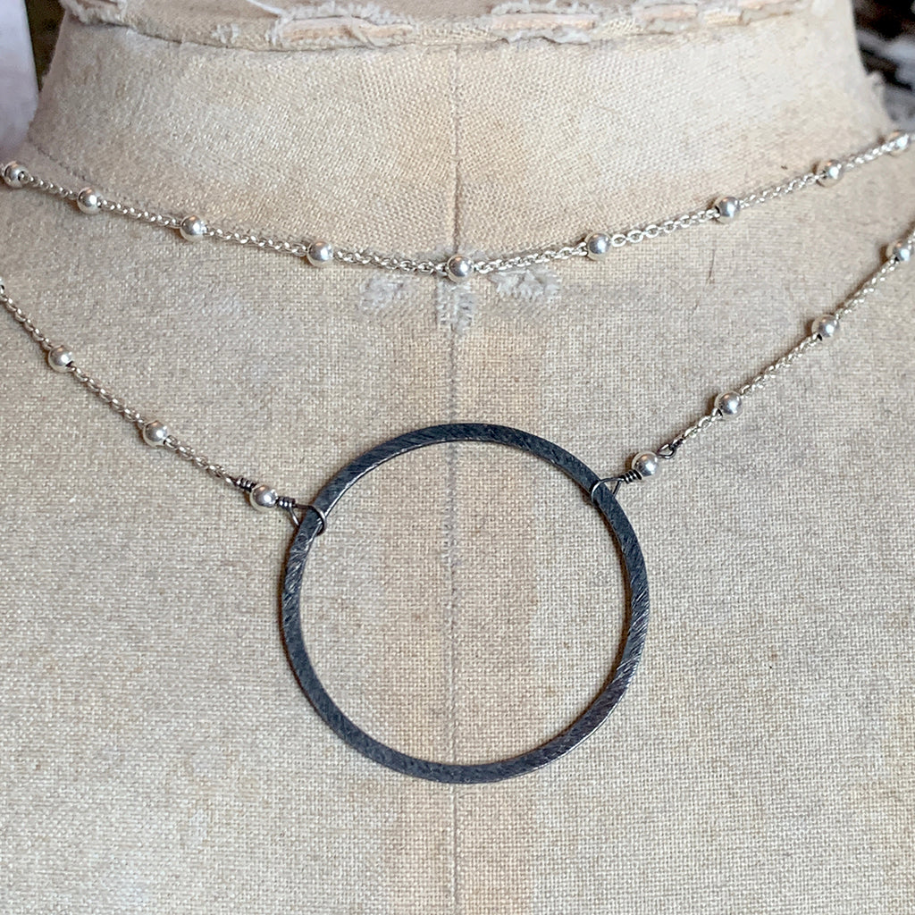 Large Oxidised Silver Halo on Bright Silver Dotted Chain Necklace