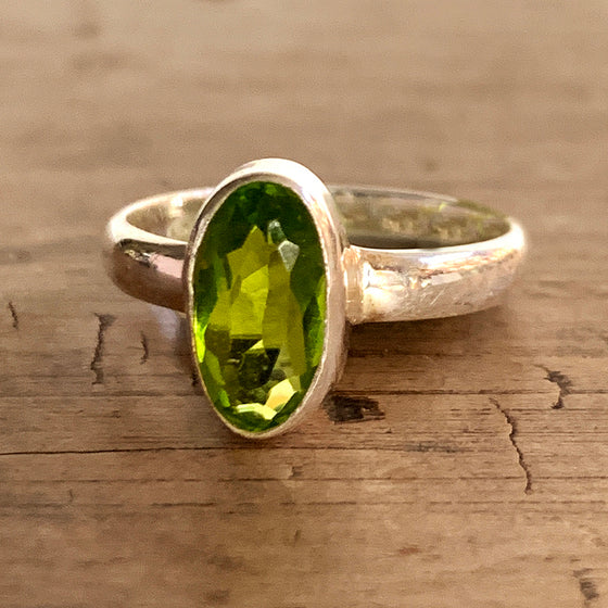 Oval Peridot Set in Silver Ring